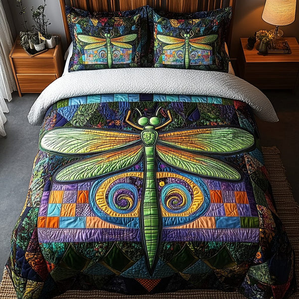 Celestial Hover quilted 3-piece bedding set on a made bed with two matching pillow shams