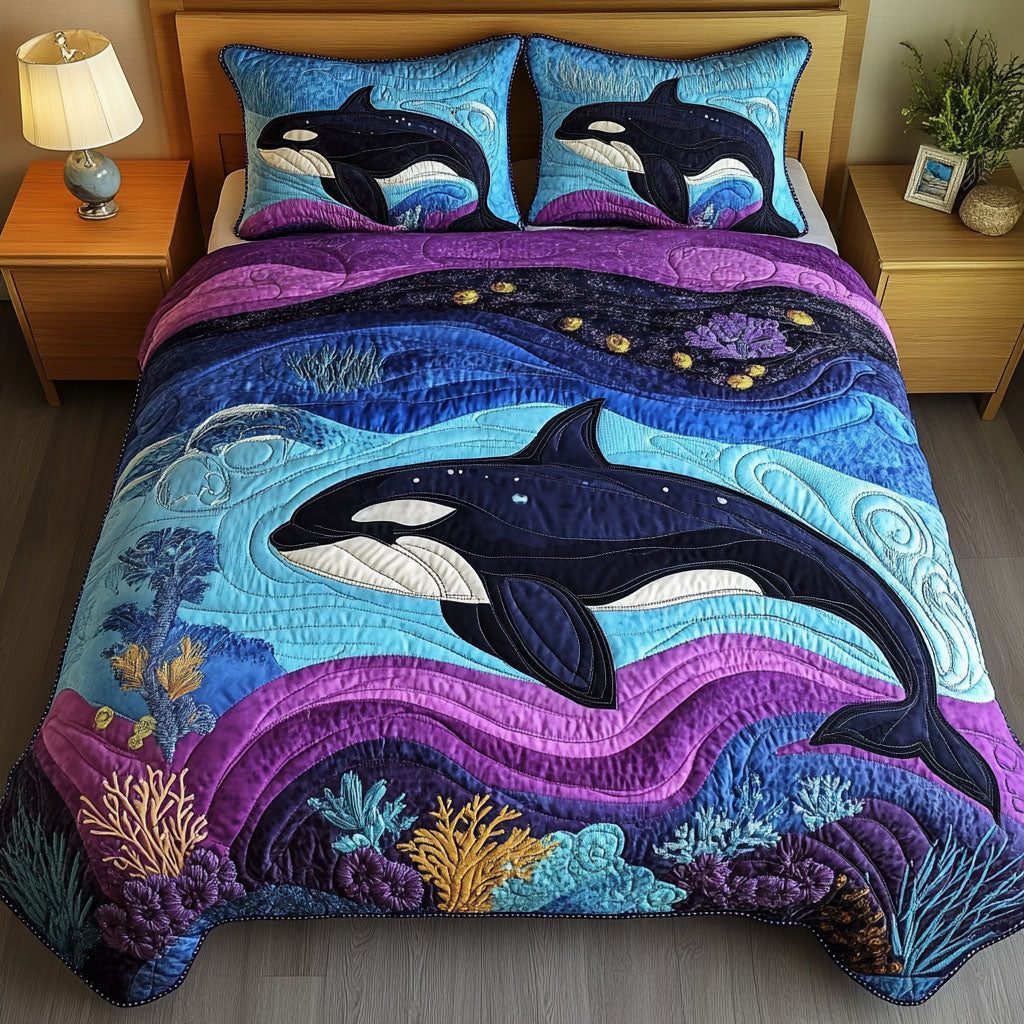 Celestial Orca quilted 3-piece bedding set on a made bed with two matching pillow shams