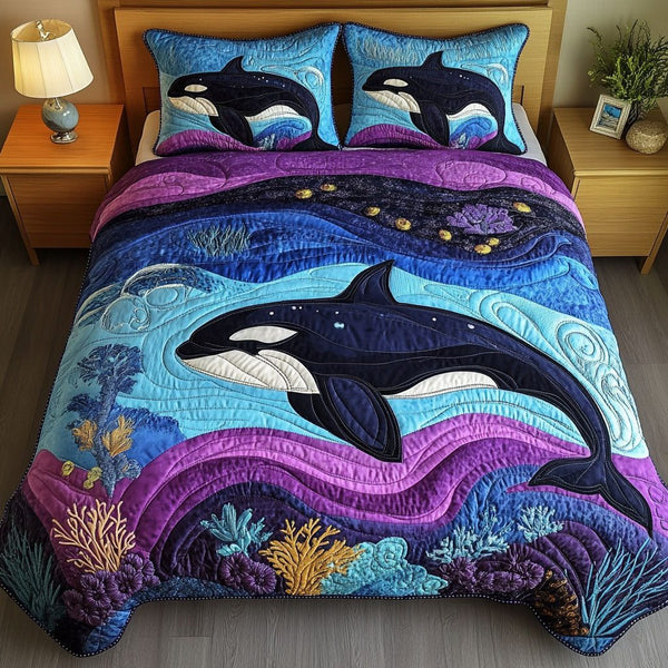 Celestial Orca quilted 3-piece bedding set on a made bed with two matching pillow shams