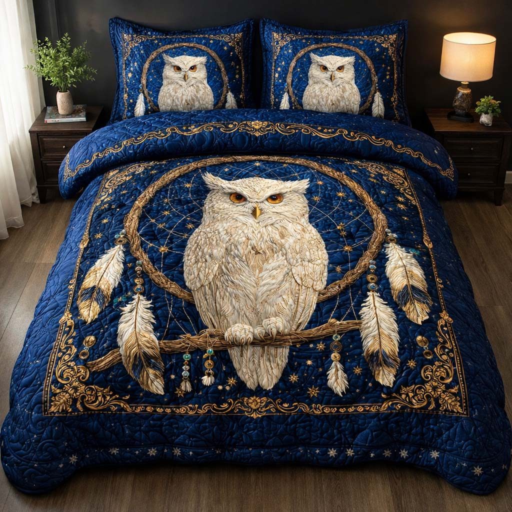 Celestial Owl Dream quilted 3-piece bedding set on a made bed with two matching pillow shams
