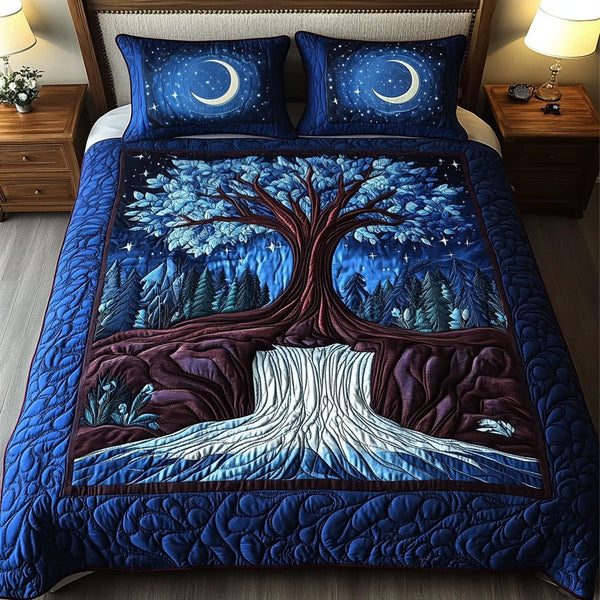 Celestial Waterfall Tree quilted 3-piece bedding set on a made bed with two matching pillow shams