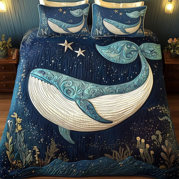 Celestial Whale Dreams quilted 3-piece bedding set on a made bed in a light coastal bedroom