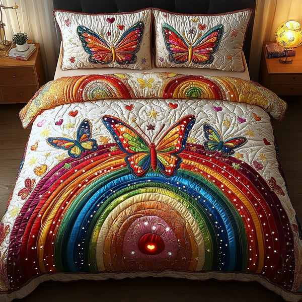 Celestial Wings quilted 3-piece bedding set on a made bed with two matching pillow shams
