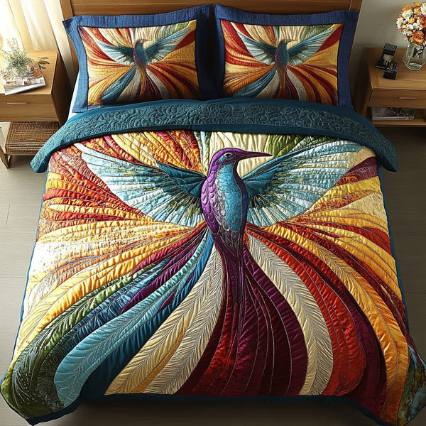 Celestial Wings quilted 3-piece bedding set on a made bed with two matching pillow shams