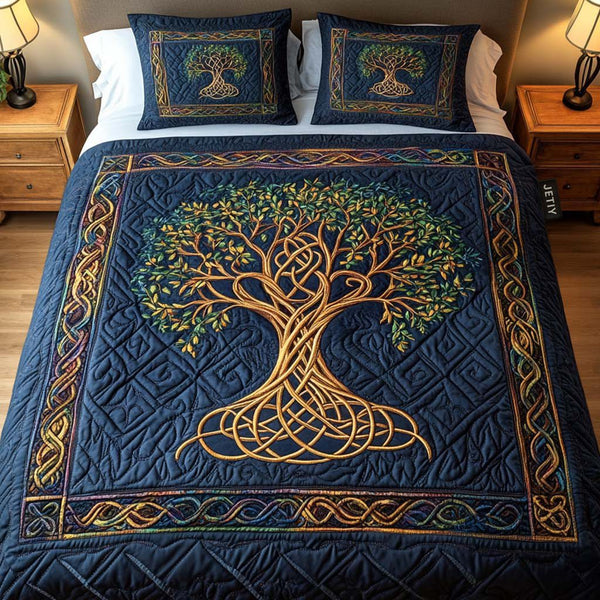Celtic Roots quilted 3-piece bedding set on a made bed with two matching pillow shams