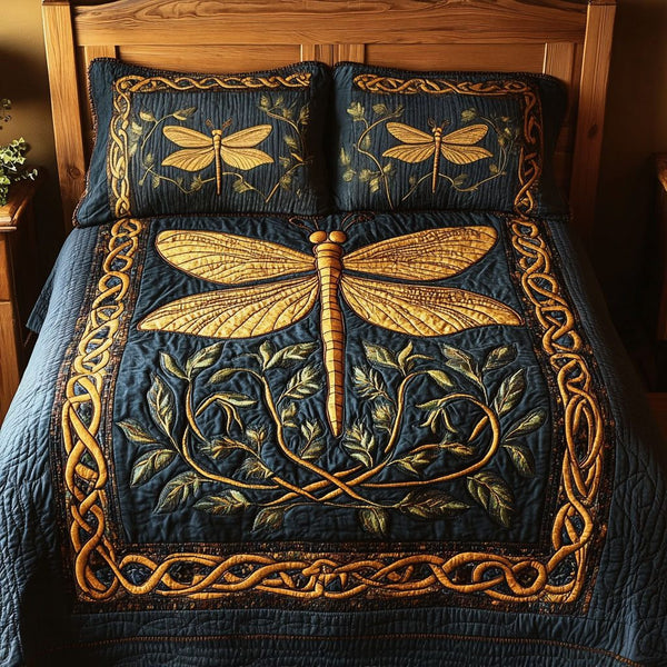 Celtic Wings quilted 3-piece bedding set on a made bed with two matching pillow shams
