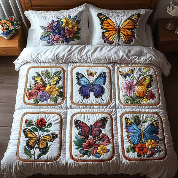 Charming Butterfly Trail quilted 3-piece bedding set on a made bed with two matching pillow shams