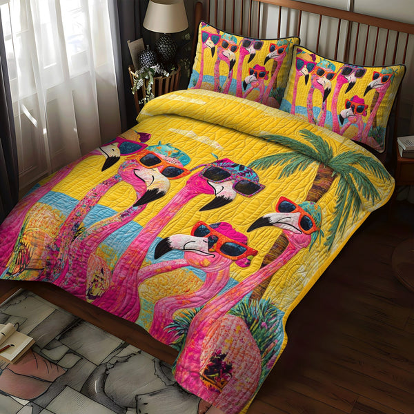 Charming Flamingo quilted 3-piece bedding set on a made bed with two matching pillow shams