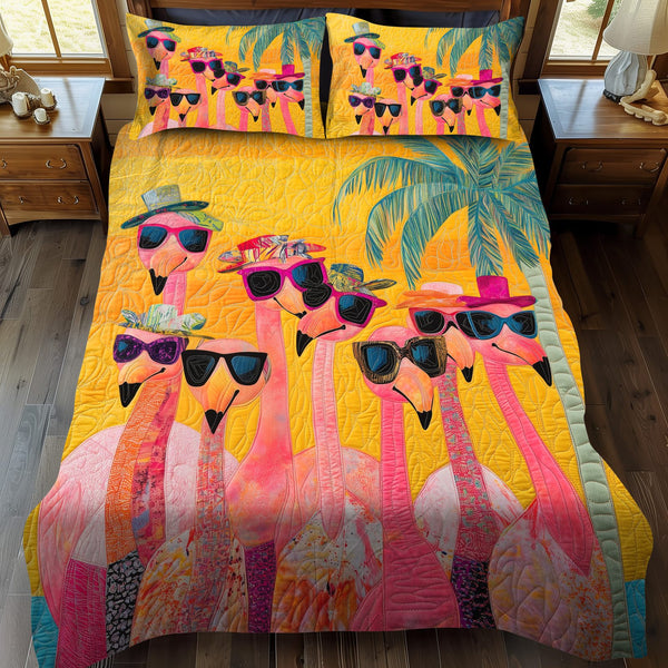 Charming Flamingo quilted 3-piece bedding set on a made bed with two matching pillow shams