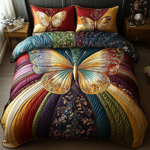 Chasing Butterflies quilted 3-piece bedding set on a made bed with two matching pillow shams