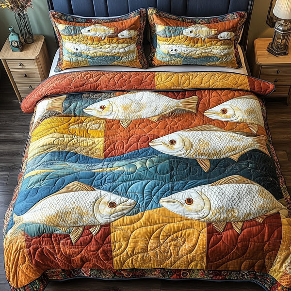 Cheerful Fishes quilted 3-piece bedding set on a made bed with two matching pillow shams
