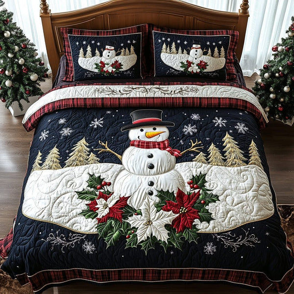 Cheerful Snowmen quilted 3-piece bedding set on a made bed with two matching pillow shams