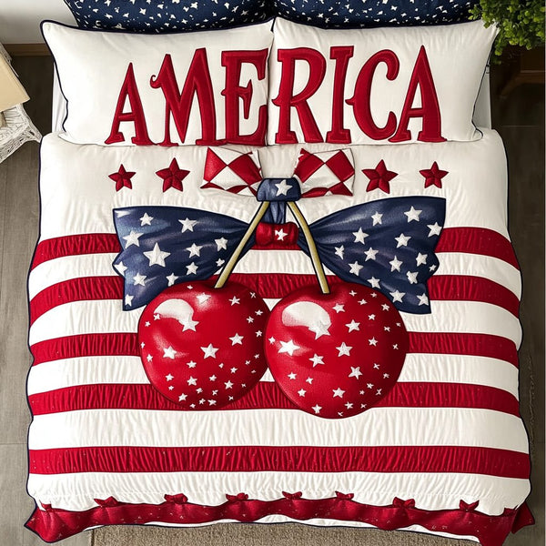 Cherry Star quilted 3-piece bedding set on a made bed with two matching pillow shams