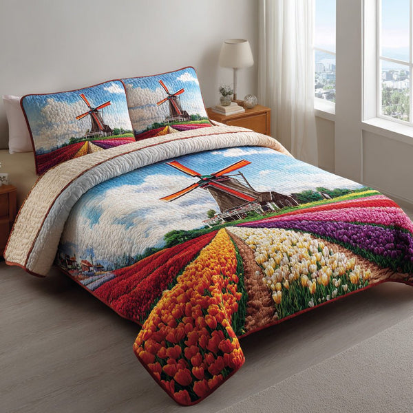 Cherry Sunrise quilted 3-piece bedding set on a made bed with two matching pillow shams