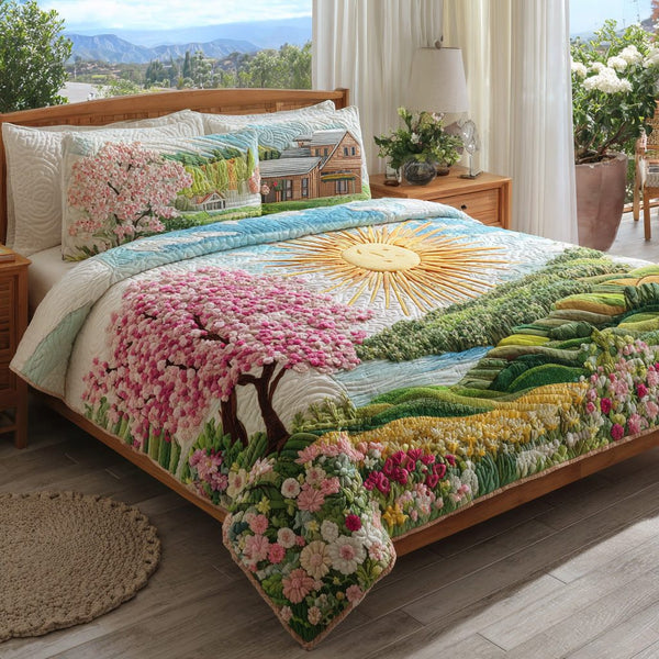 Cherry Valley quilted 3-piece bedding set on a made bed with two matching pillow shams
