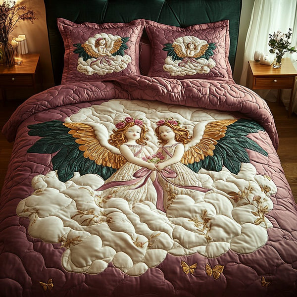Cherub Glow quilted 3-piece bedding set on a made bed with two matching pillow shams