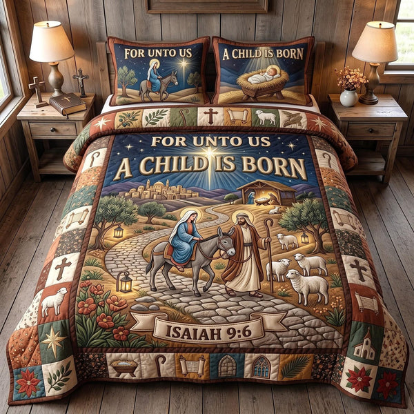 Child Is Born quilted 3-piece bedding set on a made bed with two matching pillow shams
