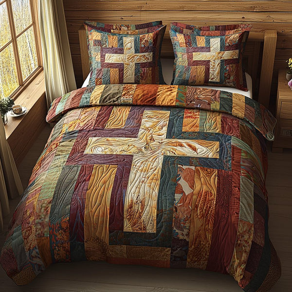 Christian Cross Blessings quilted 3-piece bedding set on a made bed in a softly lit bedroom