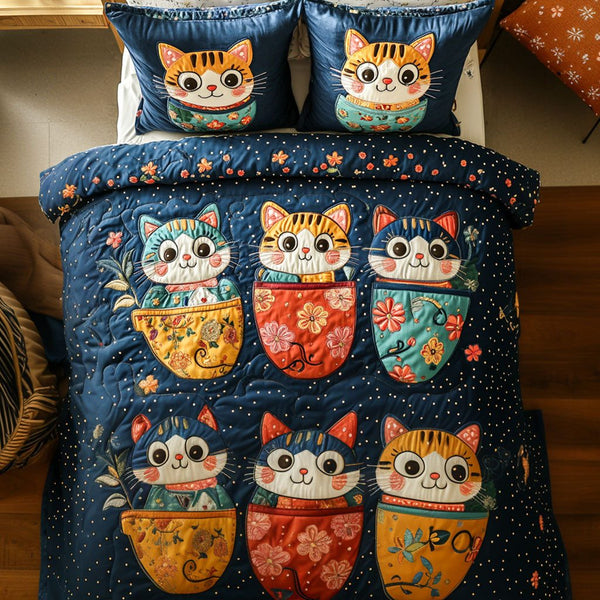 Chubby Mug Kitties quilted 3-piece bedding set on a made bed with two matching pillow shams