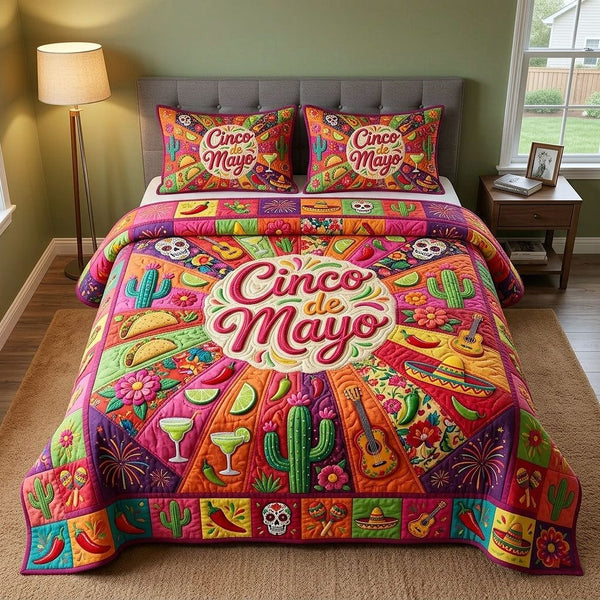 Cinco de Mayo quilted 3-piece bedding set on a made bed with two matching pillow shams