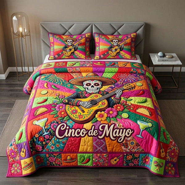 Cinco de Mayo quilted 3-piece bedding set on a made bed with two matching pillow shams