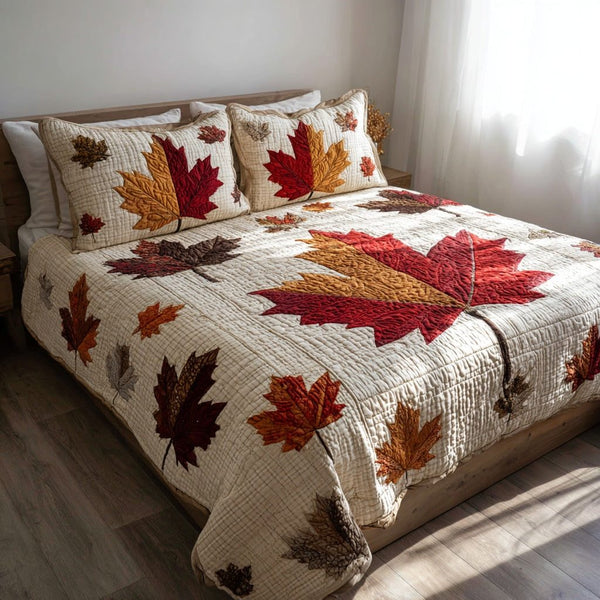 Classic Autumn Foliage quilted 3-piece bedding set on a made bed in a farmhouse bedroom
