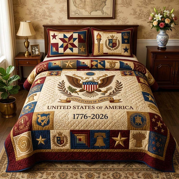 Classic Emblem quilted 3-piece bedding set on a made bed in a farmhouse bedroom