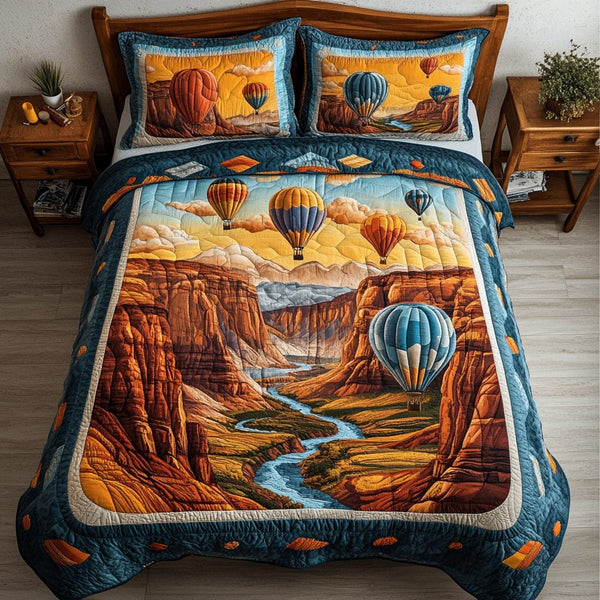 Cloud Ride quilted 3-piece bedding set on a made bed with two matching pillow shams