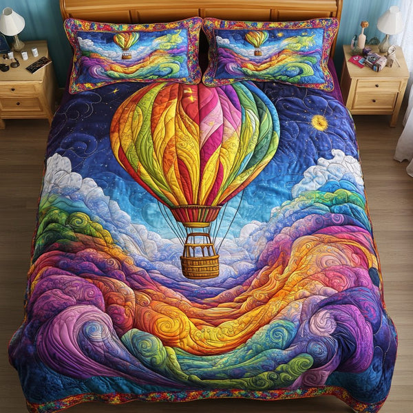 Cloud Voyager quilted 3-piece bedding set on a made bed with two matching pillow shams