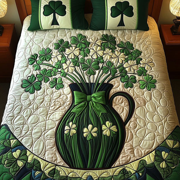 Clover Bouquet quilted 3-piece bedding set on a made bed with two matching pillow shams