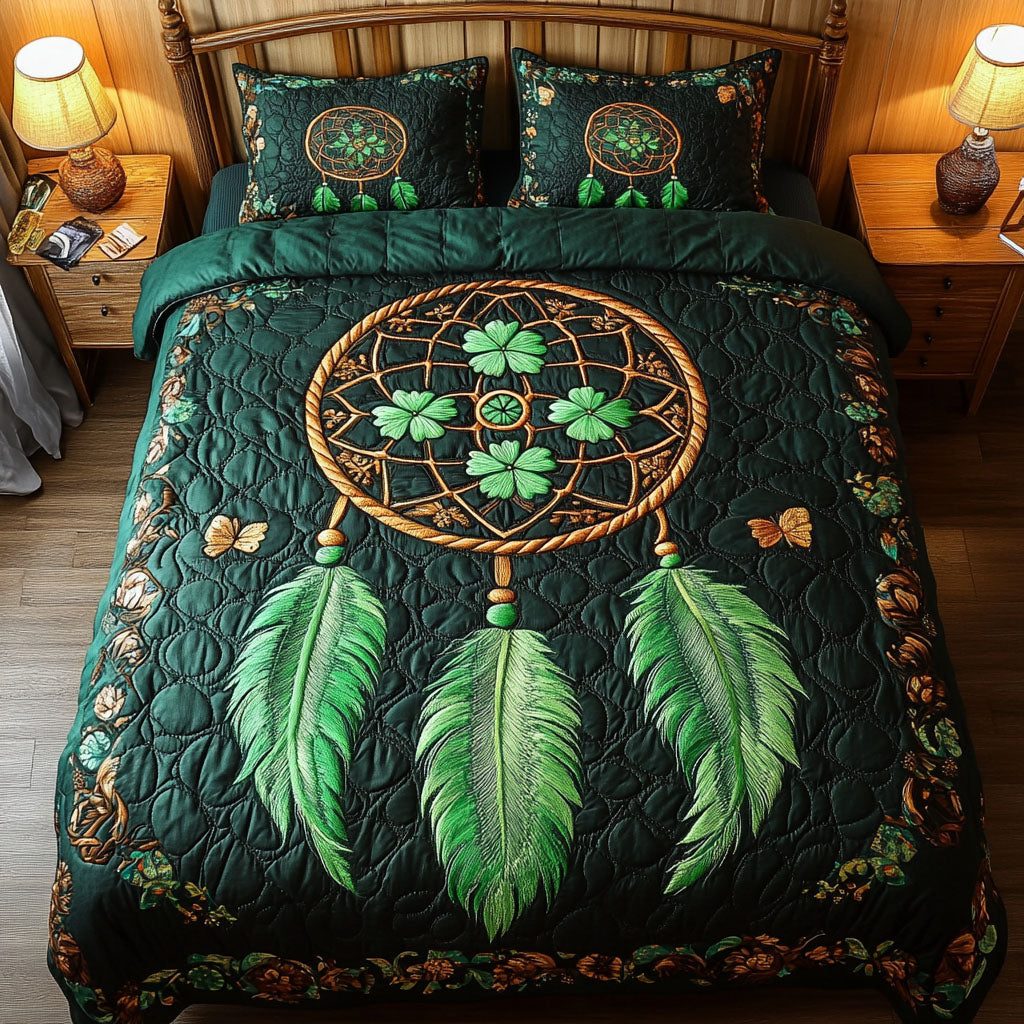 Clover Dreamcatcher quilted 3-piece bedding set on a made bed with two matching pillow shams