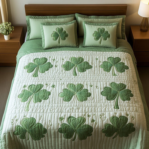 Clover Dreams quilted 3-piece bedding set on a made bed with two matching pillow shams