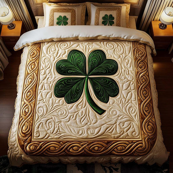 Clover Elegance quilted 3-piece bedding set on a made bed with two matching pillow shams