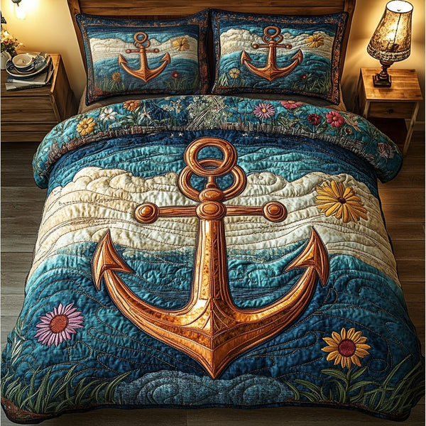 Coastal Anchor quilted 3-piece bedding set on a made bed in a light coastal bedroom