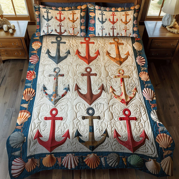 Coastal Anchors quilted 3-piece bedding set on a made bed in a light coastal bedroom