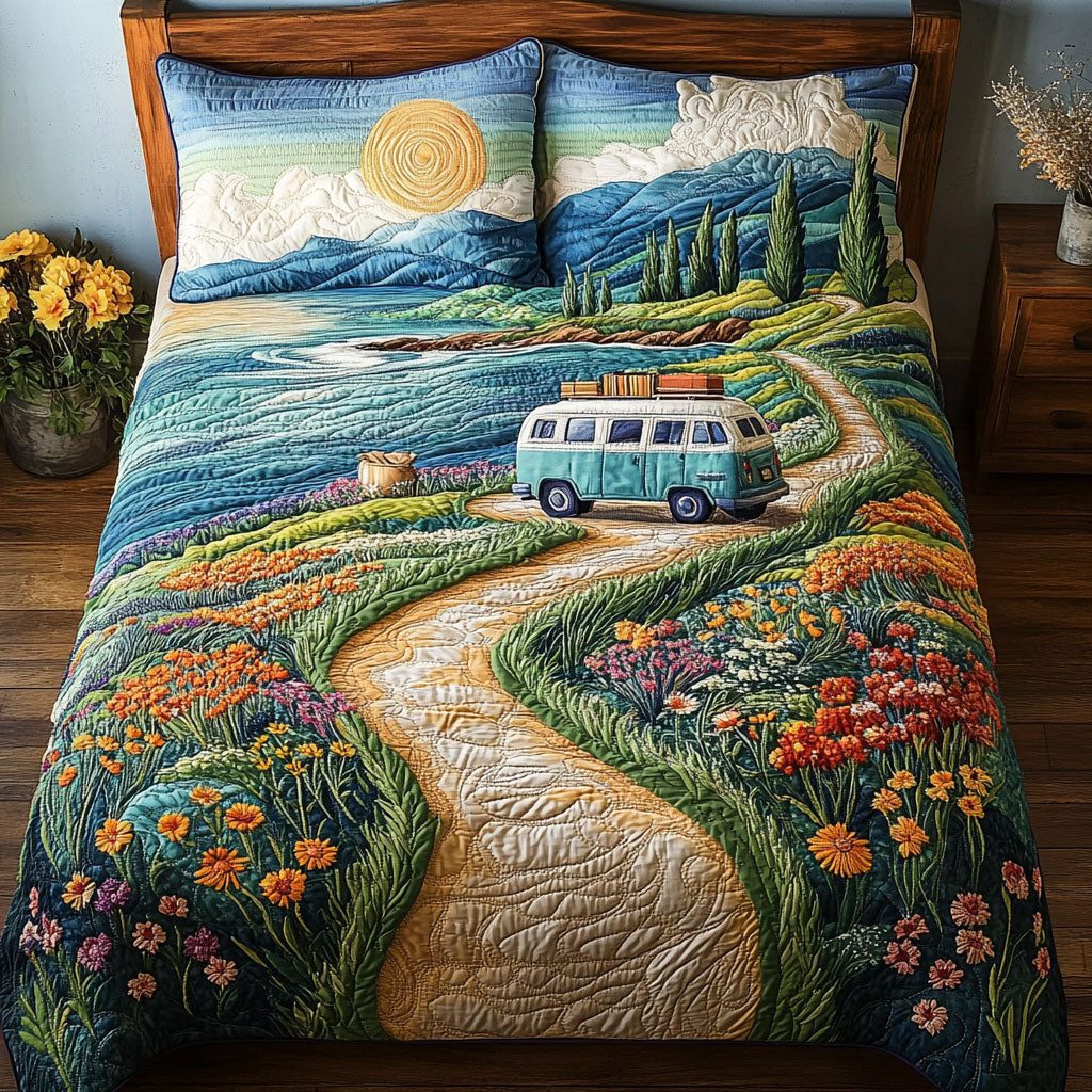Coastal Bliss quilted 3-piece bedding set on a made bed in a light coastal bedroom