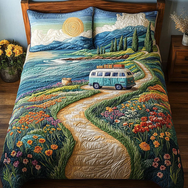 Coastal Bliss quilted 3-piece bedding set on a made bed in a light coastal bedroom