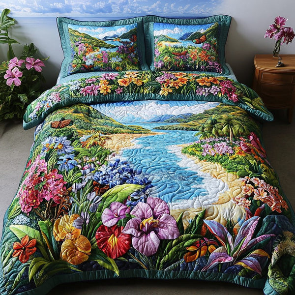Coastal Bliss quilted 3-piece bedding set on a made bed in a light coastal bedroom