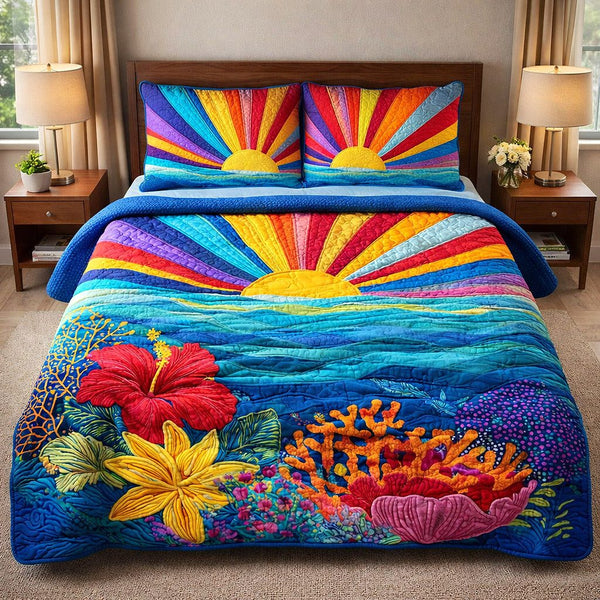 Coastal Breeze quilted 3-piece bedding set on a made bed in a light coastal bedroom