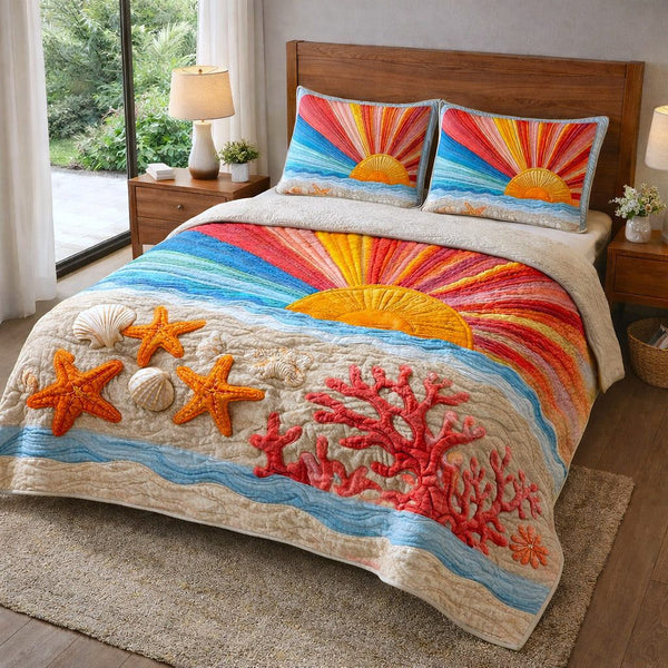 Coastal Breeze quilted 3-piece bedding set on a made bed in a light coastal bedroom