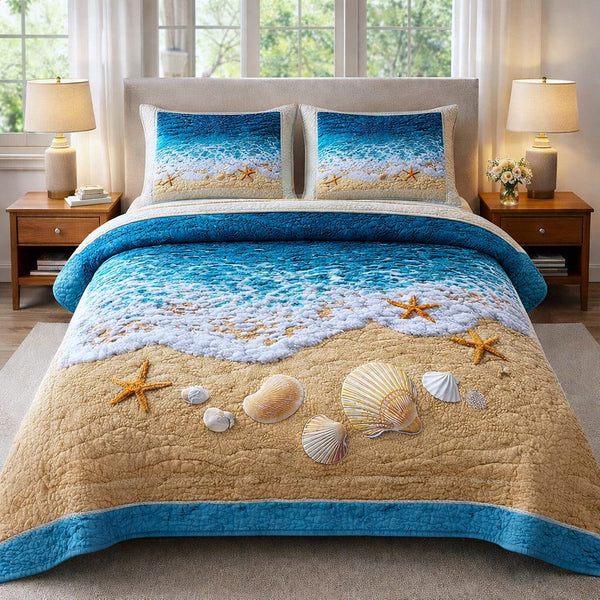 Coastal Breeze quilted 3-piece bedding set on a made bed in a light coastal bedroom