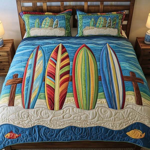 Coastal Breeze quilted 3-piece bedding set on a made bed in a light coastal bedroom