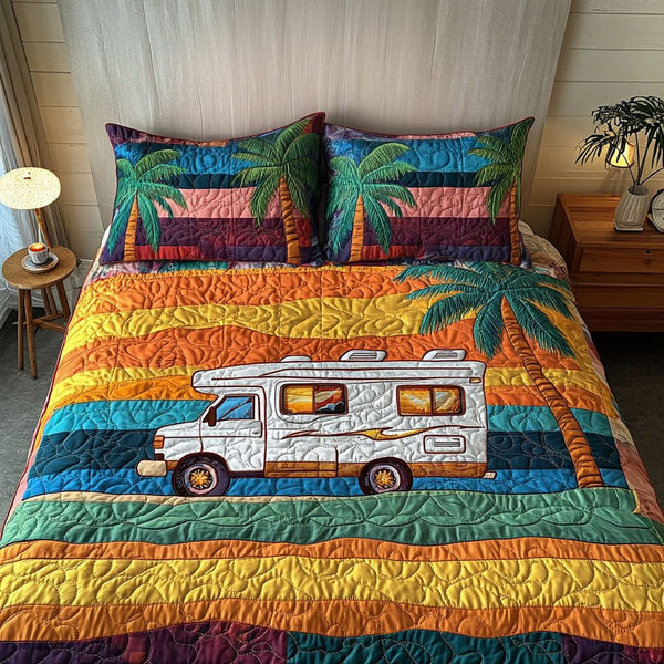 Coastal Breeze quilted 3-piece bedding set on a made bed in a light coastal bedroom