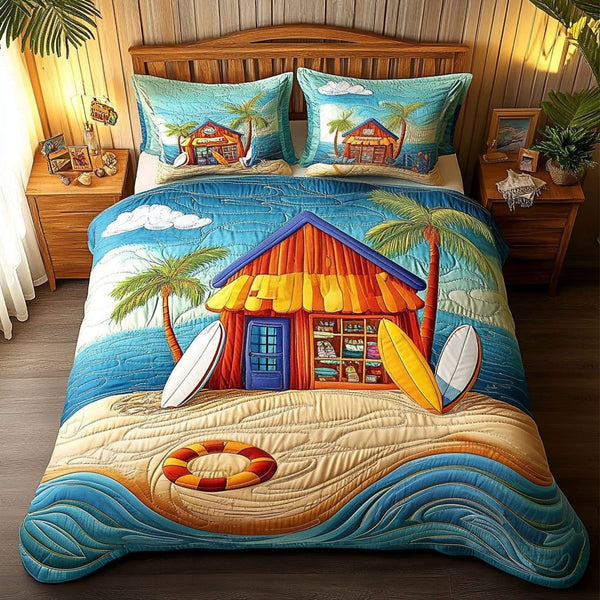 Coastal Cabin Dream quilted 3-piece bedding set on a made bed in a light coastal bedroom