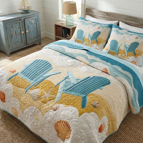 Coastal Calm quilted 3-piece bedding set on a made bed in a light coastal bedroom