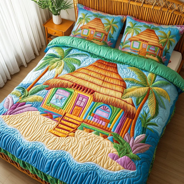 Coastal Comfort quilted 3-piece bedding set on a made bed in a light coastal bedroom