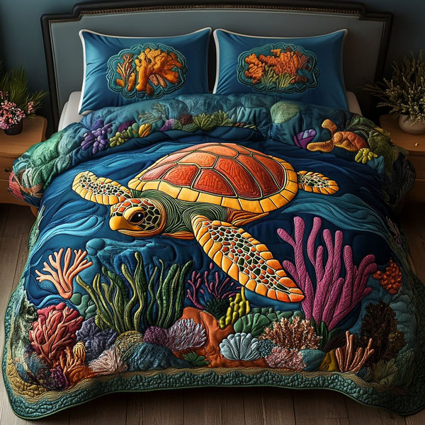 Coastal Compass quilted 3-piece bedding set on a made bed in a light coastal bedroom