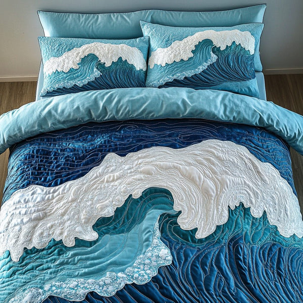 Coastal Current quilted 3-piece bedding set on a made bed in a light coastal bedroom