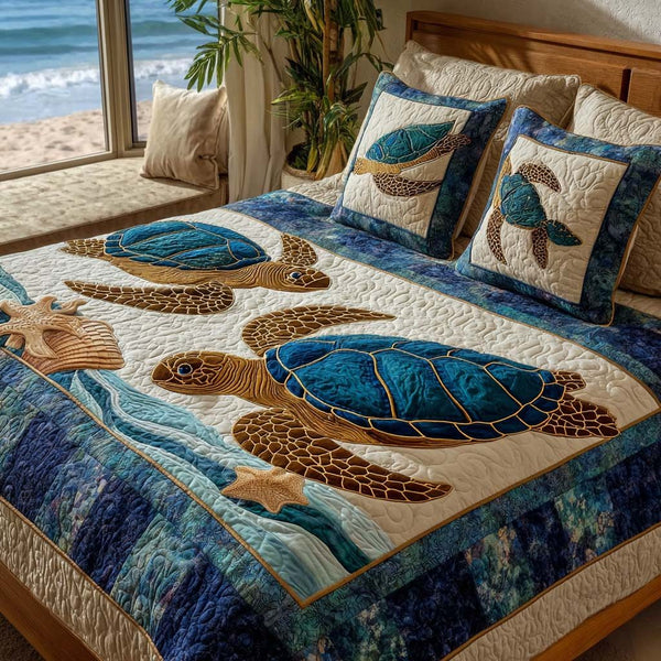 Coastal Drift quilted 3-piece bedding set on a made bed in a light coastal bedroom