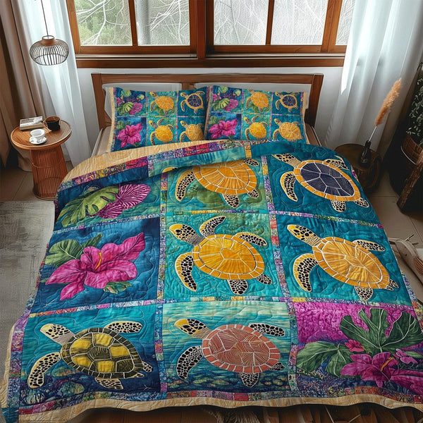 Coastal Drift quilted 3-piece bedding set on a made bed in a light coastal bedroom
